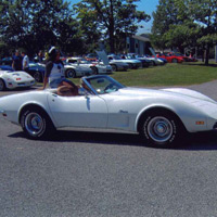 Another resident is happy to be riding in a Corvette convertible