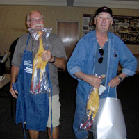 Ken Mast (left) and Jim Hartzler received special “gag” gifts
